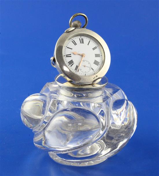 An Edwardian silver mounted spiral glass combination inkwell/pocket watch holder, 3.25in.